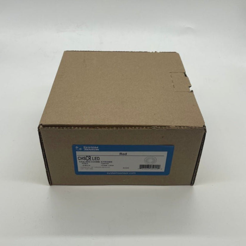 System Sensor CHSCRLED chime strobe in red, visible with bright LED light and chime components, designed for fire alarm signaling.