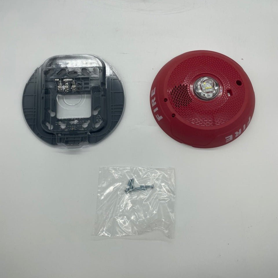 System Sensor CHSCRLED chime strobe alarm in red, featuring a bright red strobe light and chime for fire safety alerts.
