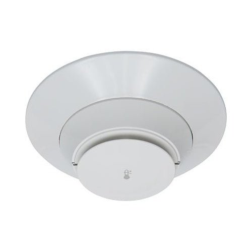 System Sensor SS-HEAT fixed thermal detector showing a compact, rectangular heat sensor with mounting base for fire detection.