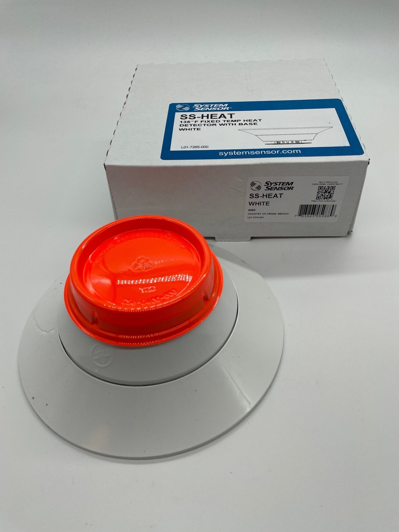System Sensor SS-HEAT fixed thermal detector, black rectangular device with mounting bracket for fire detection systems