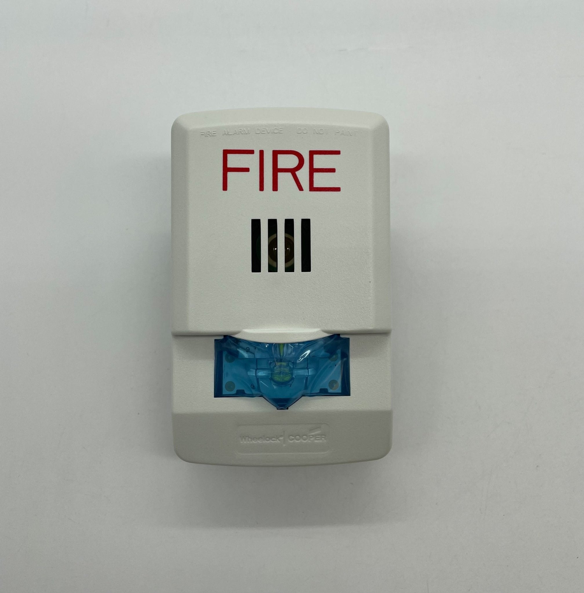 Eaton Wheelock LHSW White Wall Mount Exceder LED Horn Strobe showing white wall-mounted horn strobe with LED indicator