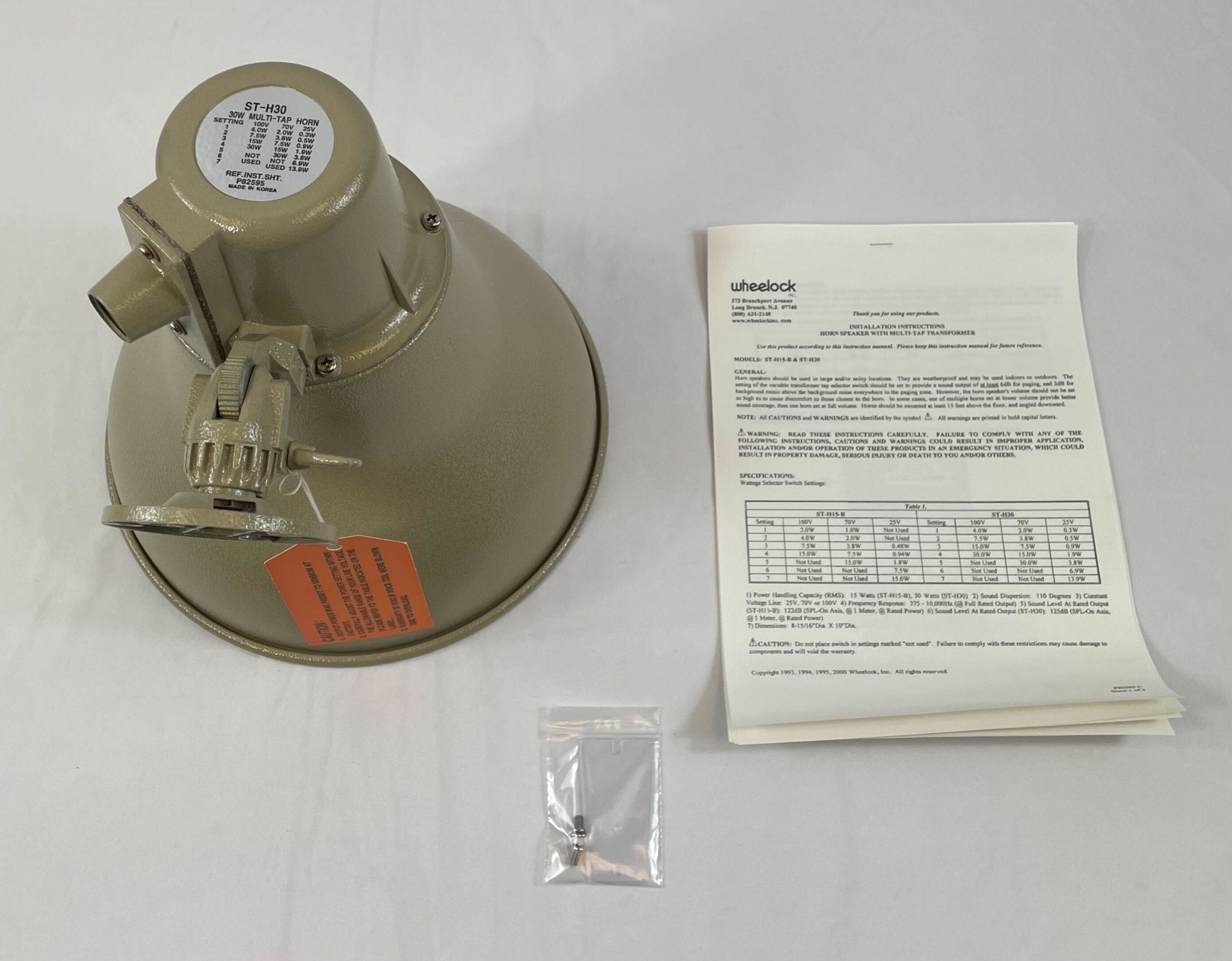 Eaton Wheelock ST-H30 paging horn speaker mounted on wall, designed for public address and emergency alert systems.