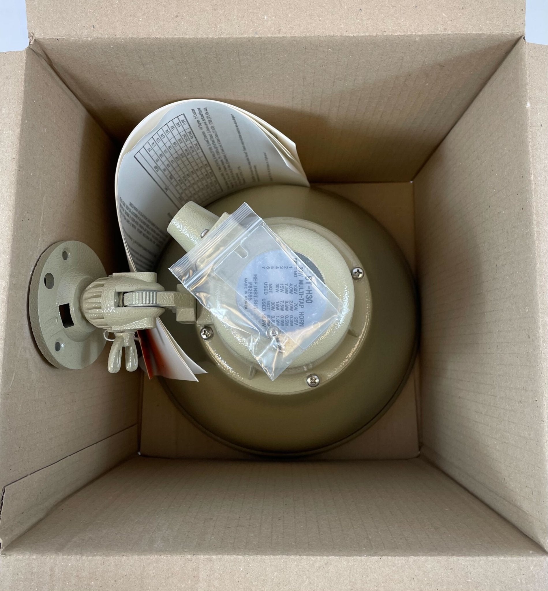 Eaton Wheelock ST-H30 paging horn speaker with a black weather-resistant housing and mounting bracket for public address systems.