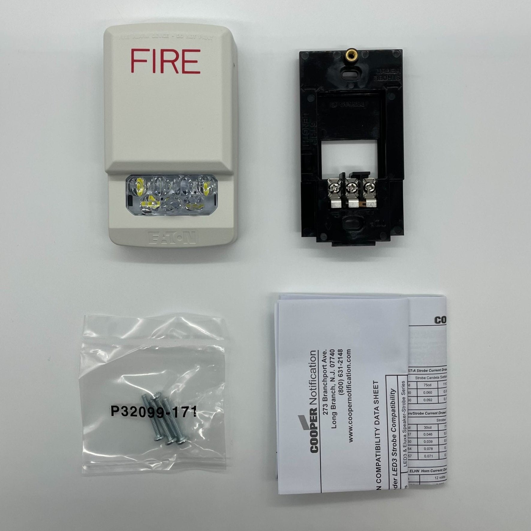 Eaton Wheelock Eluxa Strobe LED light with clear lens and mounting bracket for emergency signaling and visual alerts.