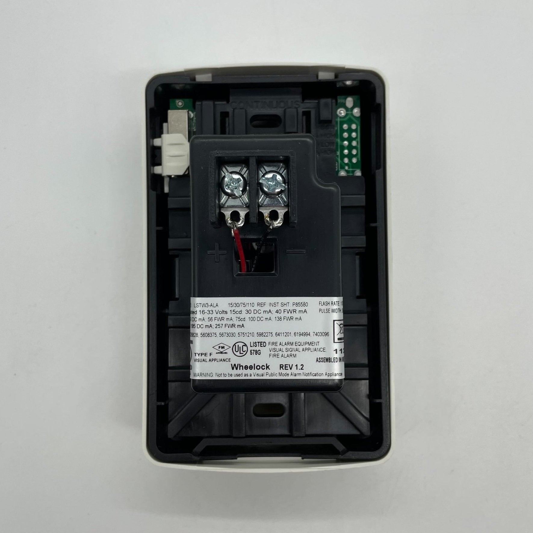 Eaton Wheelock Exceder LED3 Strobe light with red lens and mounting bracket for emergency signaling and visual alerts.