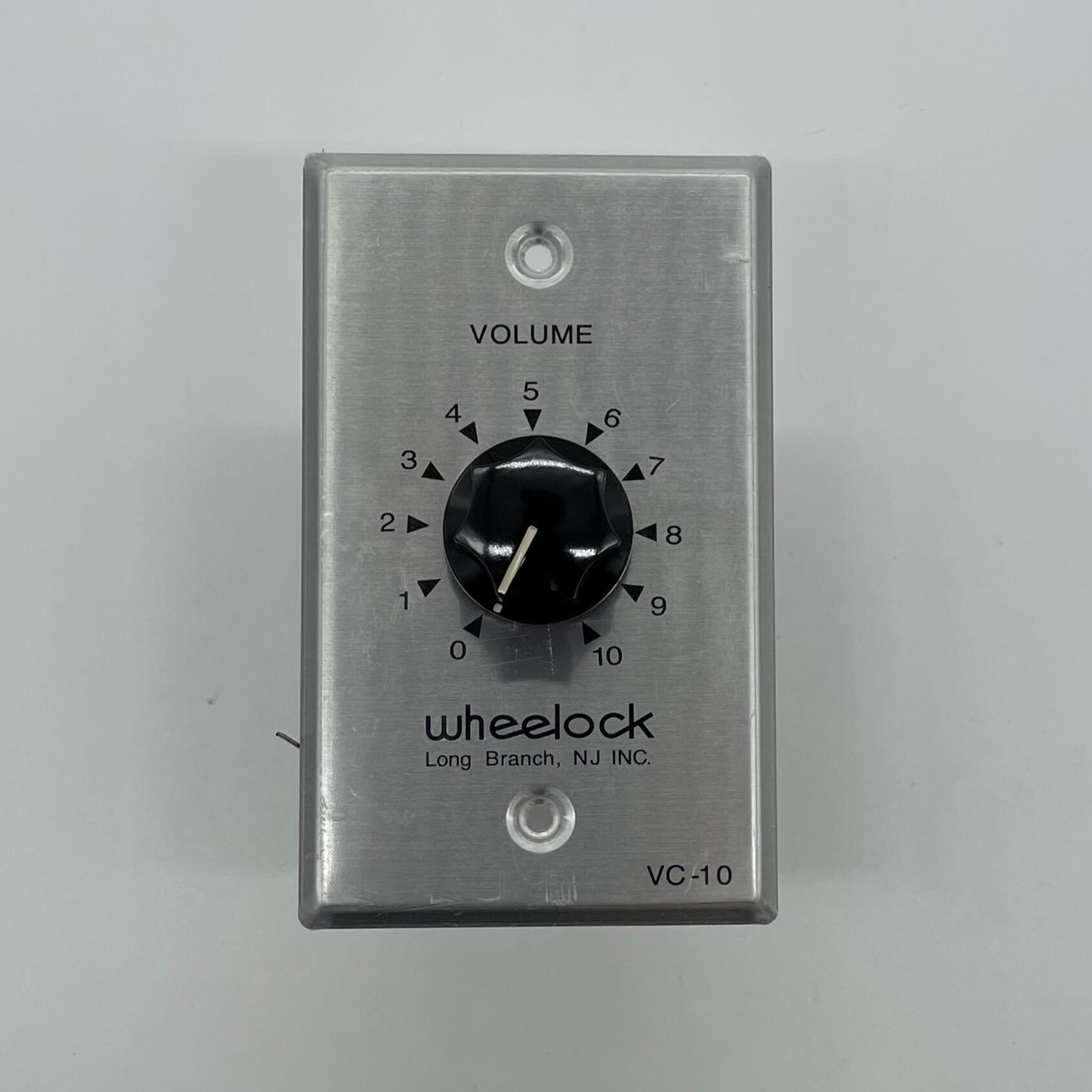 Eaton Wheelock VC-10 volume control knob with dial and mounting hardware, used for audio and sound system adjustments.