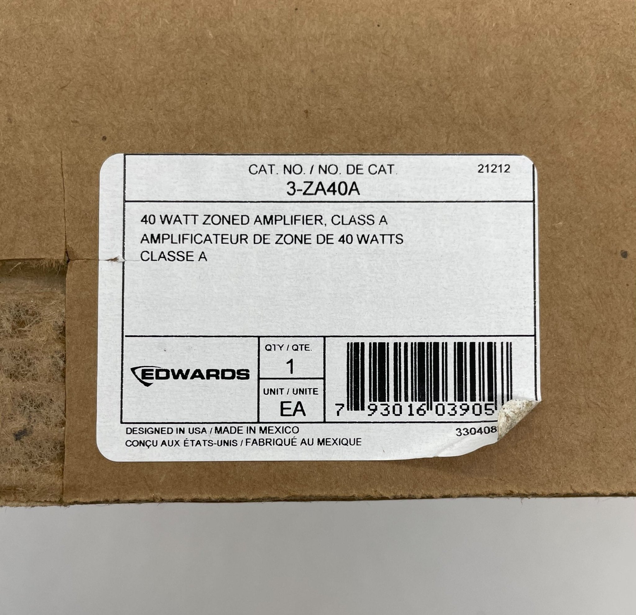 Edwards 3-ZA40A amplifier from Edwards, featuring controls and input ports, designed for professional audio amplification.