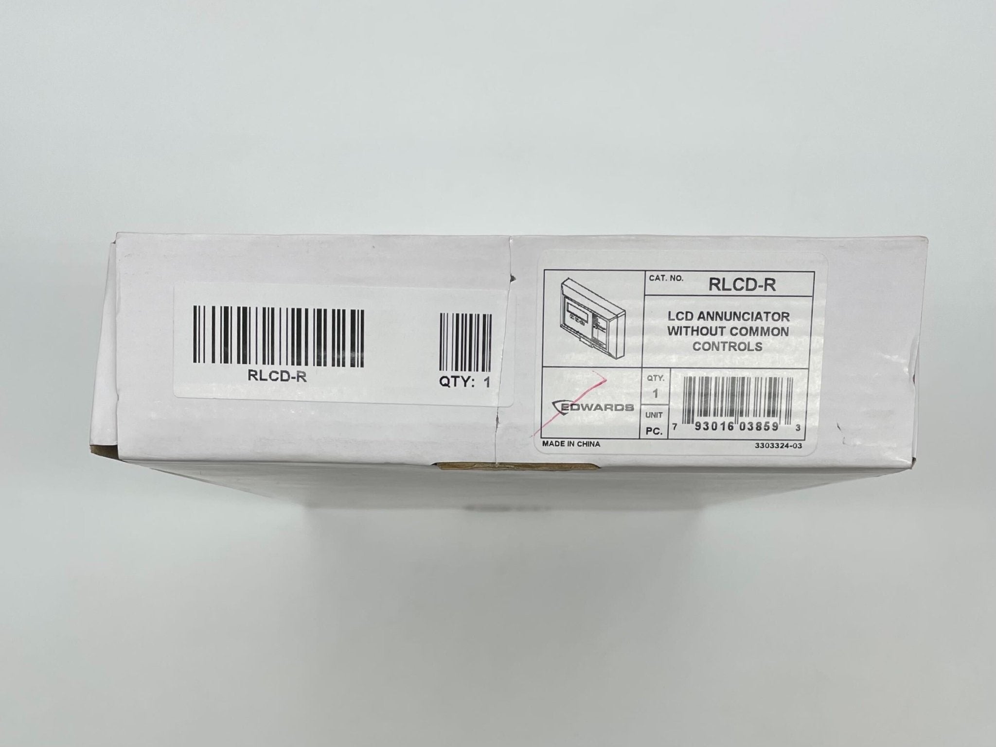 Edwards RLCD-R remote annunciator with 4x20 character LCD display showing status indicators and control buttons.