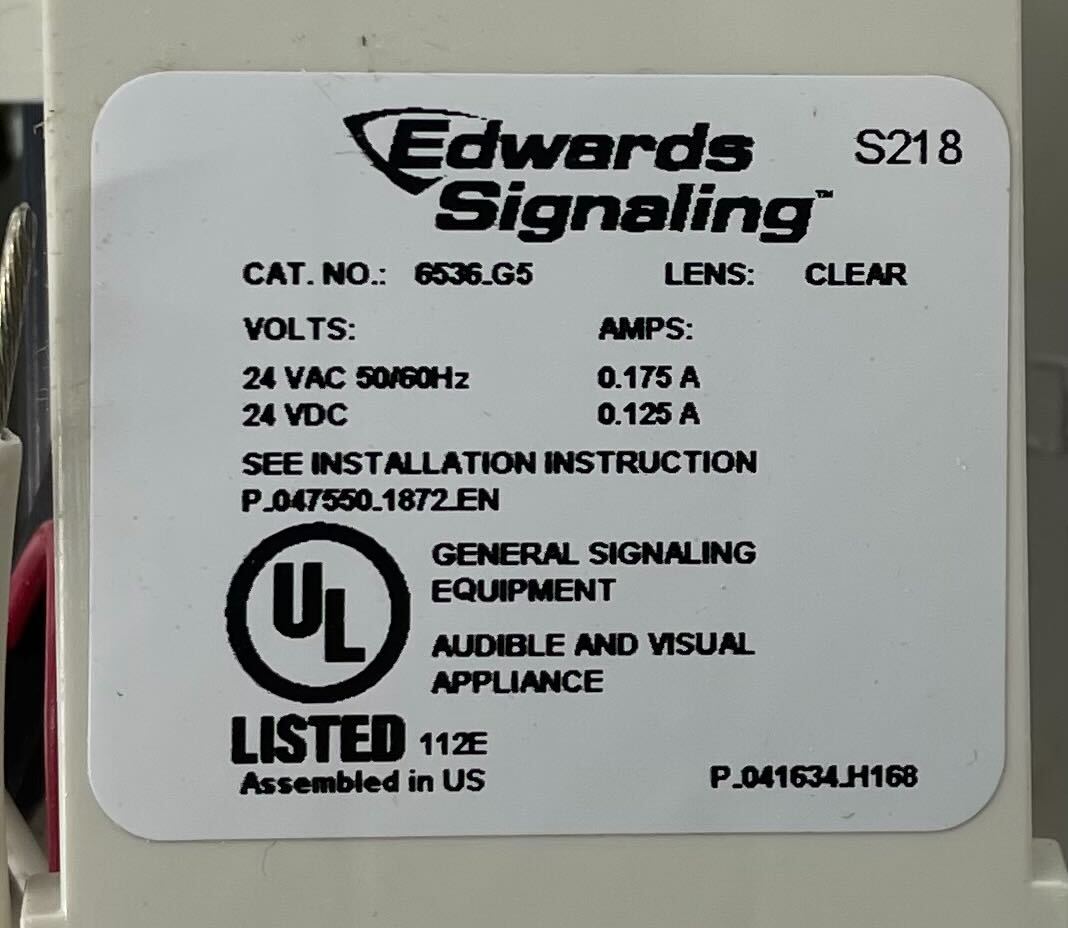 Edwards 6536-G5 Mini Horn Strobe with white housing and clear lens, compact alarm horn strobe for safety and alert systems.