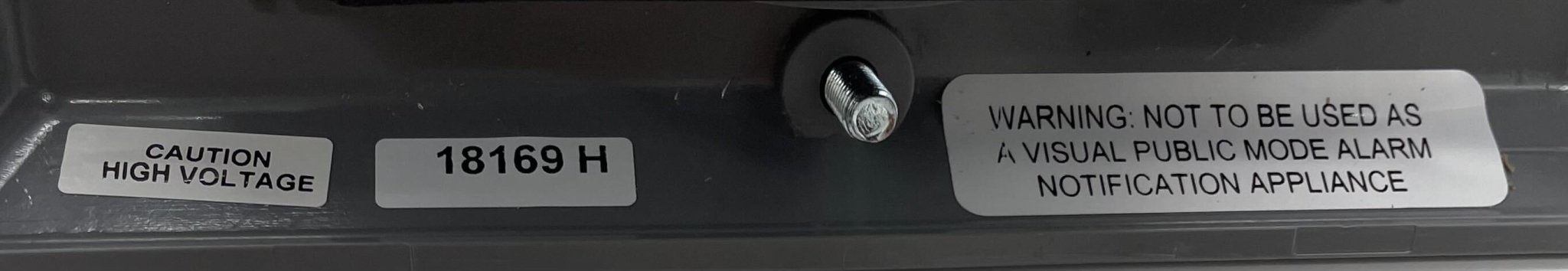 Edwards 868STRA-N5 horn strobe alarm with yellow housing and mounting bracket, designed for emergency alert systems.