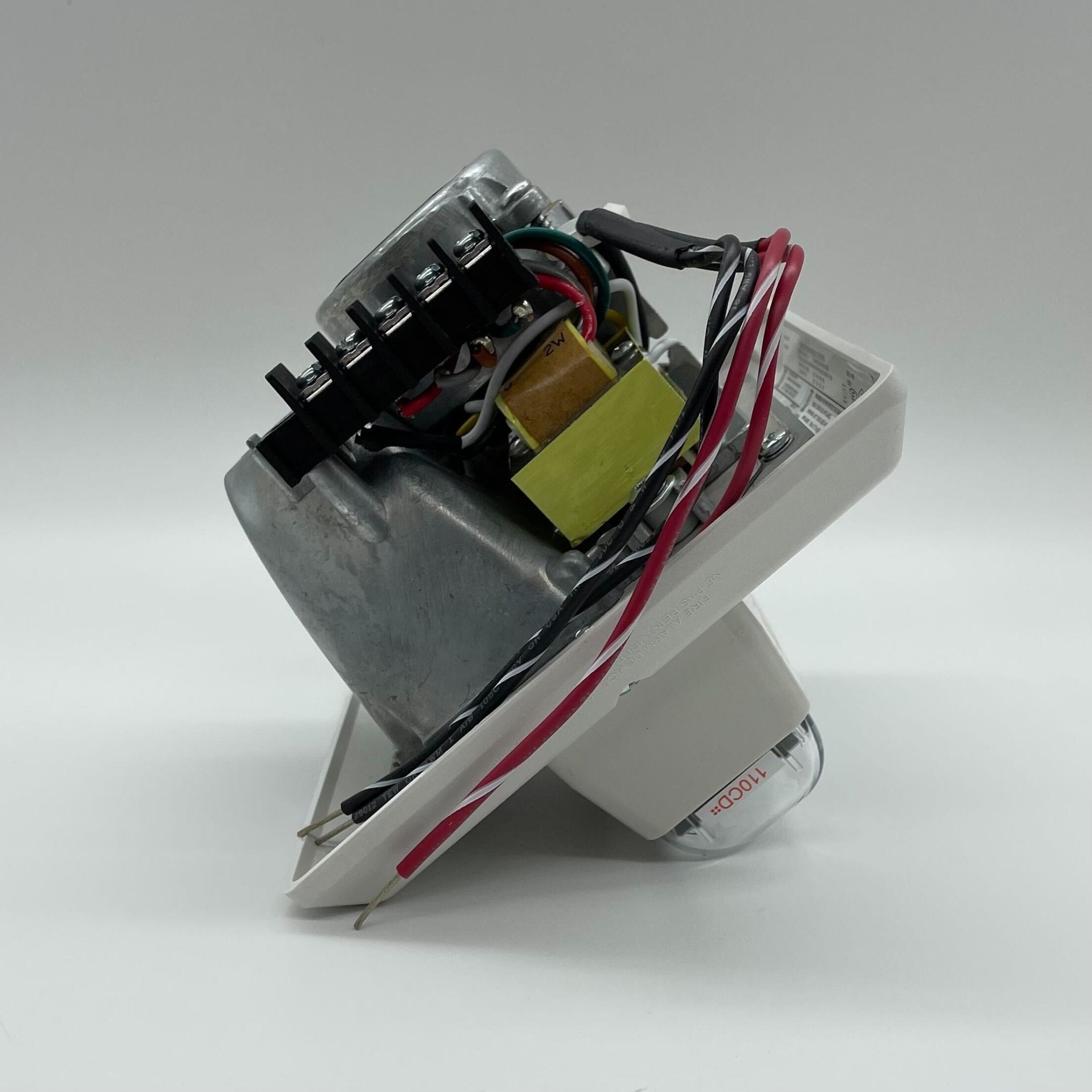 Edwards 757-8A-RS70W white re-entrant speaker strobe with 70V output, mounted on wall, for emergency alert systems