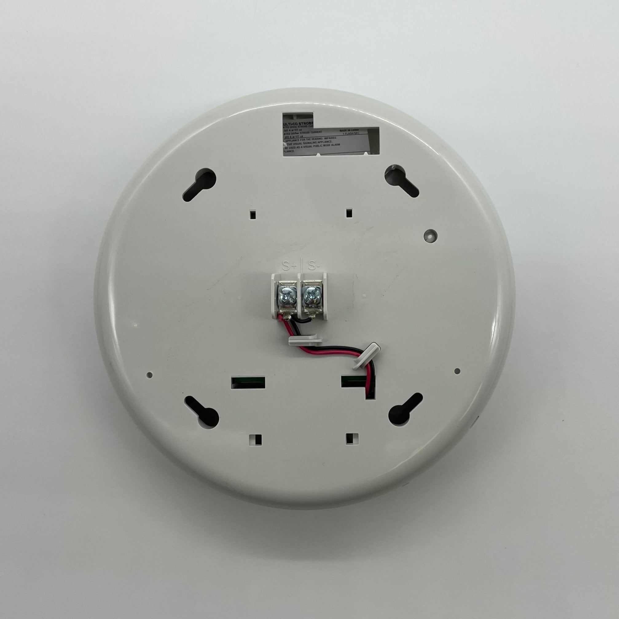 Edwards GC-VMH white ceiling strobe with clear lens, emergency warning light, mounted on ceiling for safety signaling.