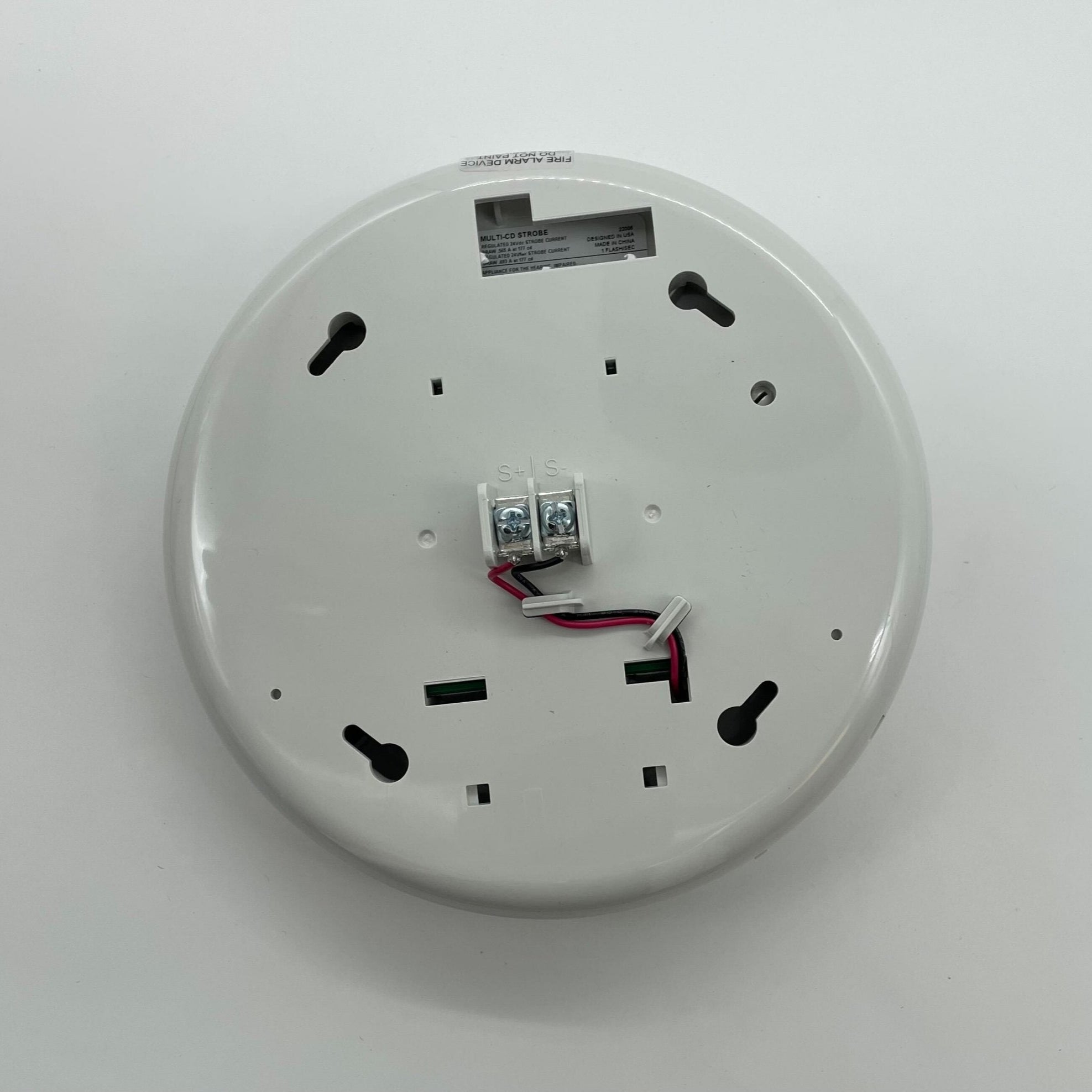 Edwards GCF-VMH Genesis Ceiling Strobe mounted on ceiling, visible in a commercial or industrial setting, with clear LED flashing.