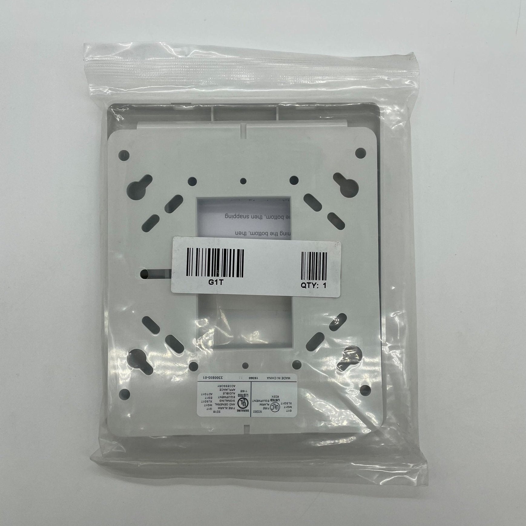 Edwards G1T Genesis trim plate with sleek silver trim ring for a modern bathroom faucet installation.