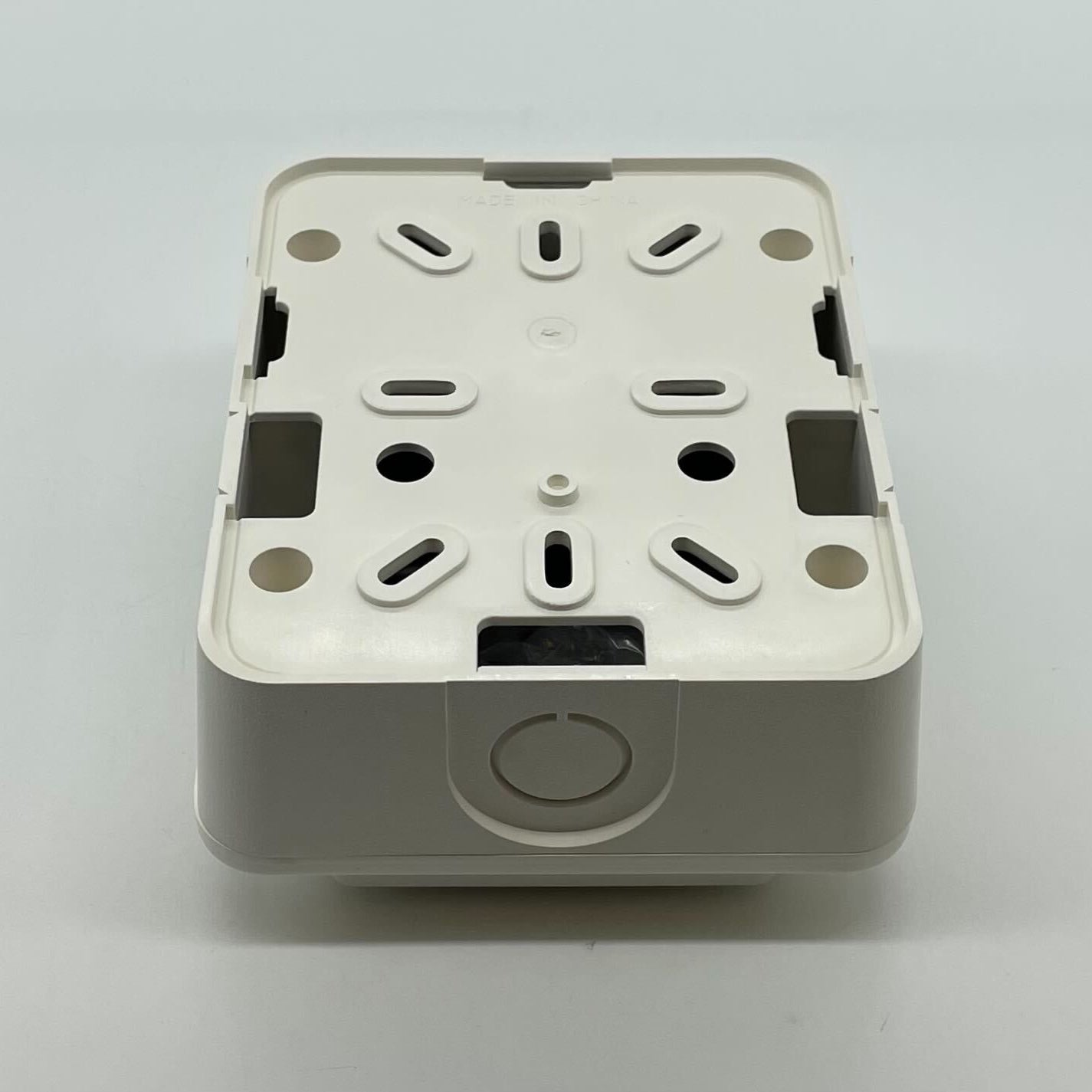 Gentex GTSM-W synchronization module for vehicle systems, shown with its compact design and connection ports.