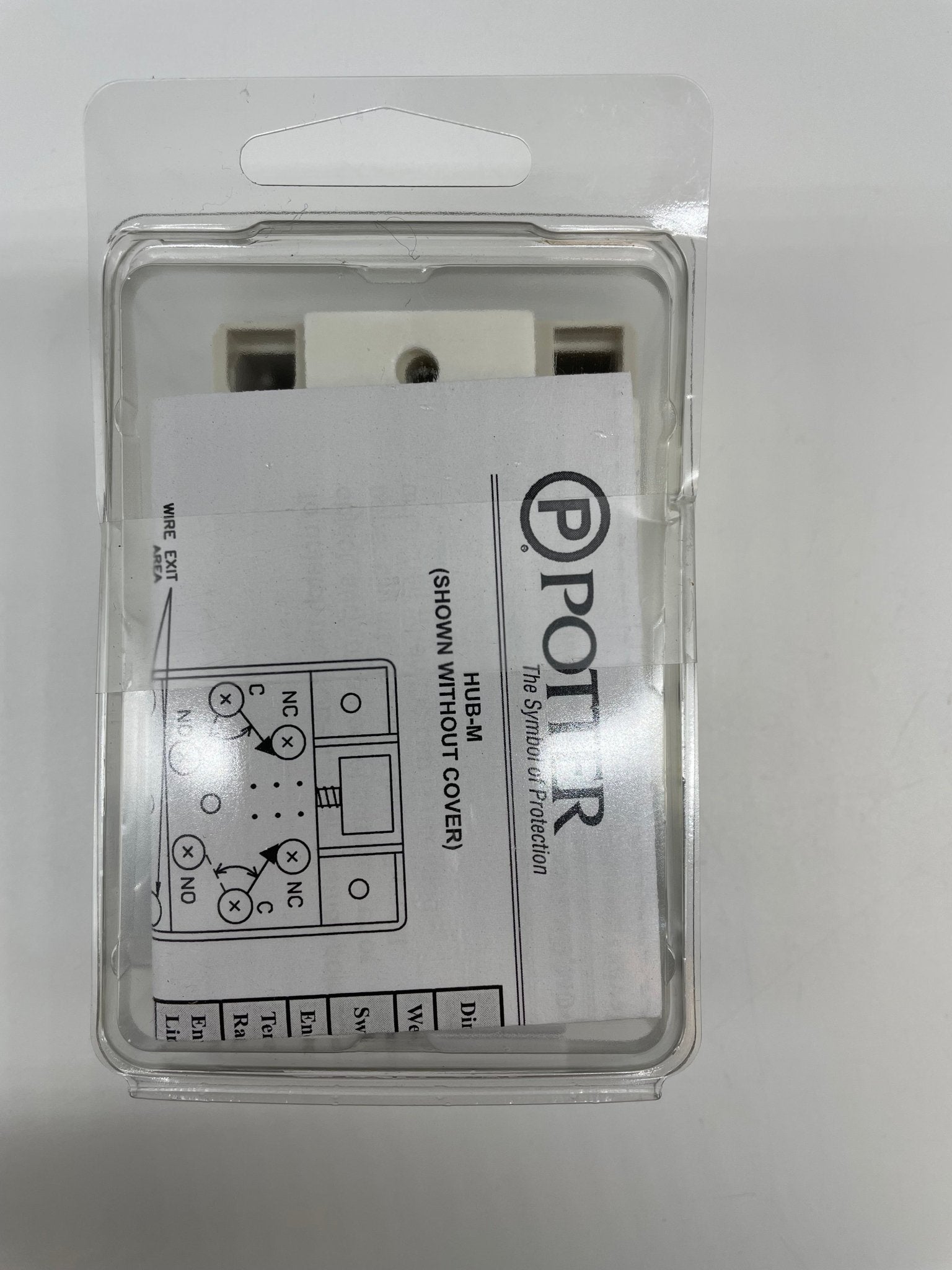 Potter HUB-M fire alarm hold-up switch with single button, used for emergency control in fire safety systems.