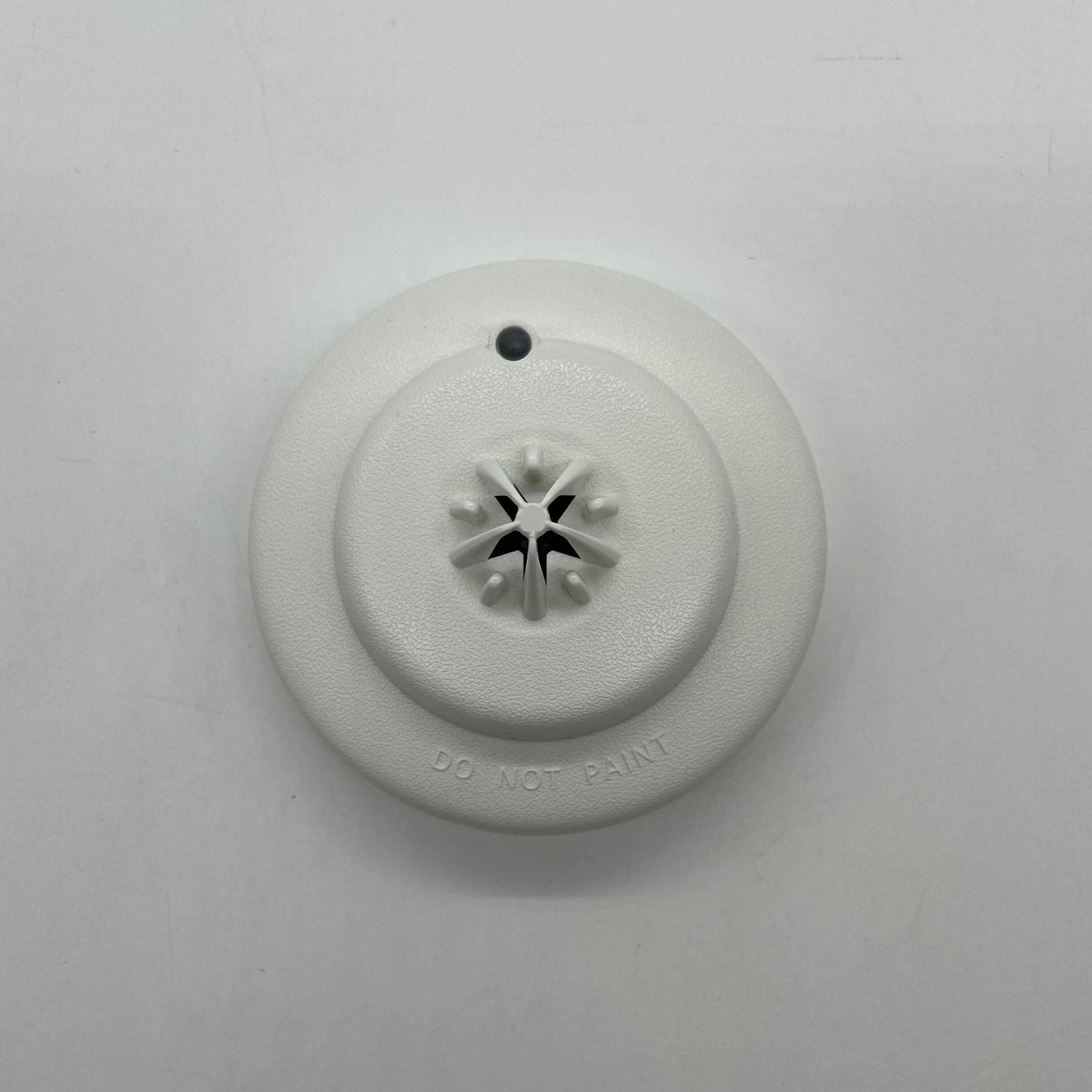 Potter PAD100-HD rate of rise fixed temperature heat detector showing sensor with wiring and mounting bracket.