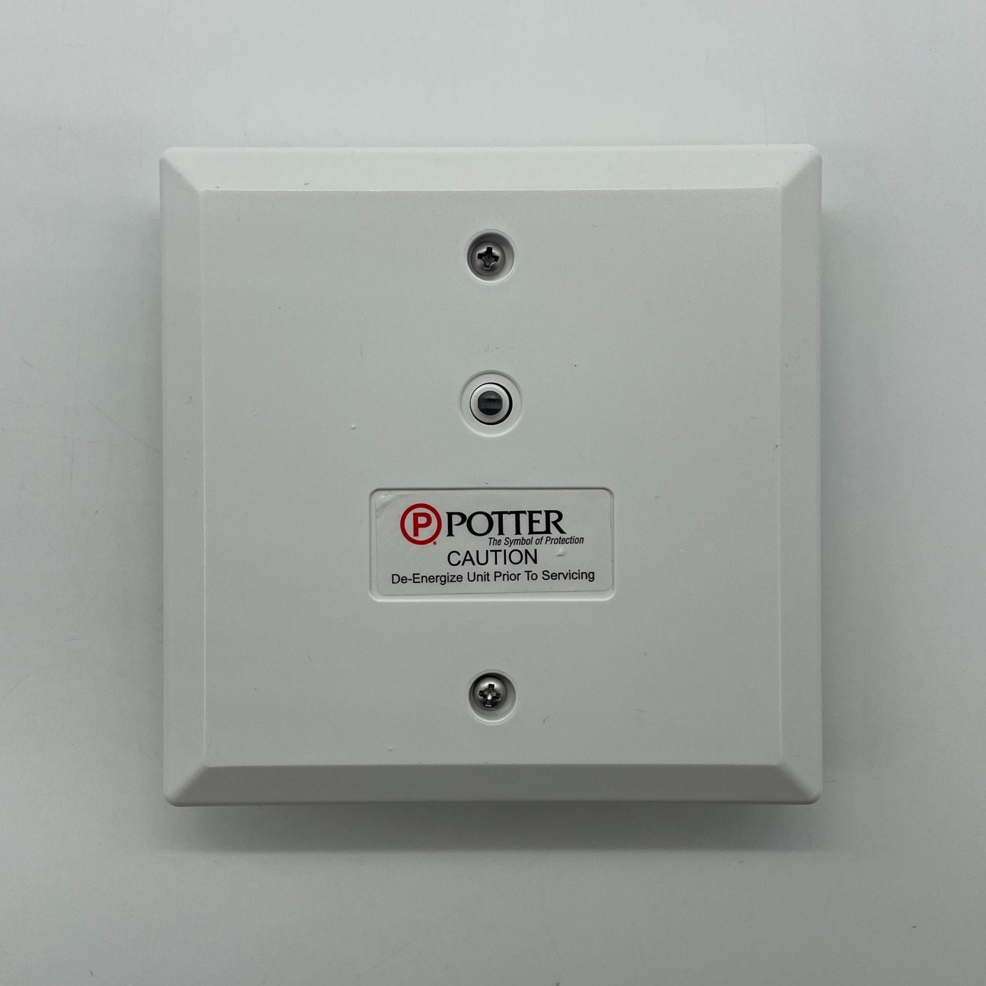 Potter PAD100-DIM dual input module for fire alarm systems, gray plastic enclosure with connection ports.