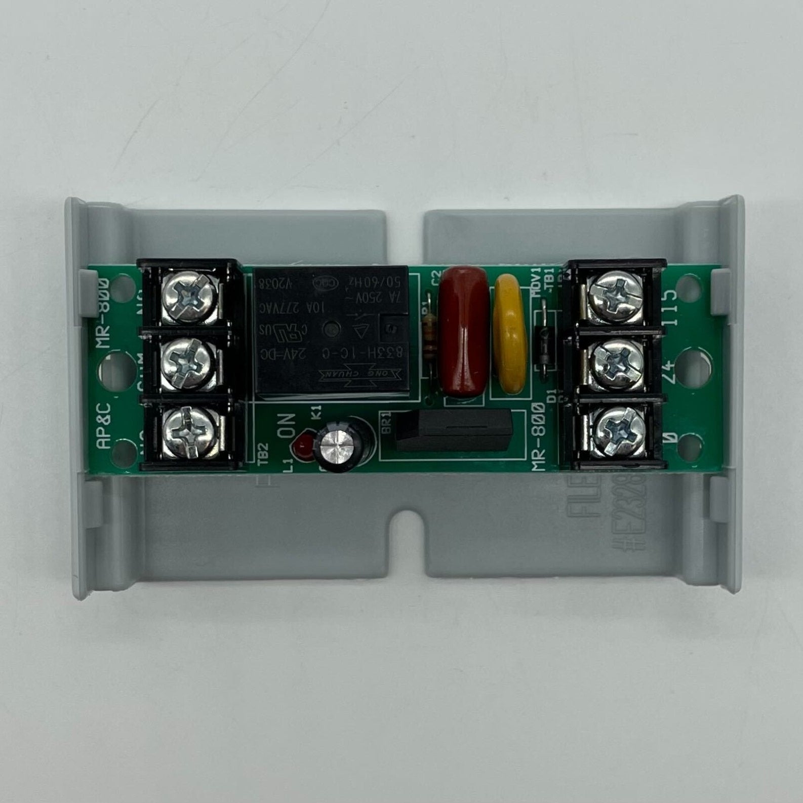 Potter MR-801/T SPDT relay mounted on a track with wiring terminals, used for electrical switching applications.