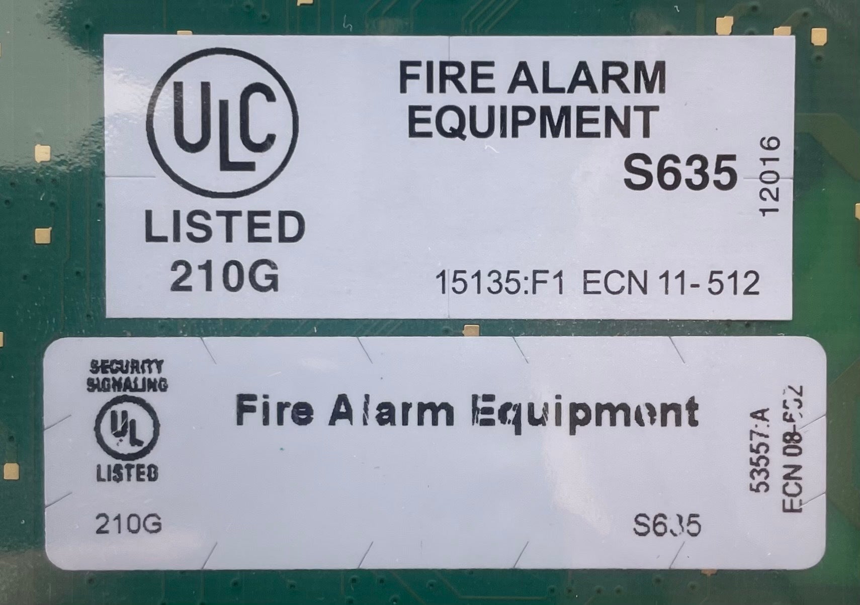Protectwell PTW-NCA-SC fire alarm assembly showing the device with wiring and mounting components for safety detection.