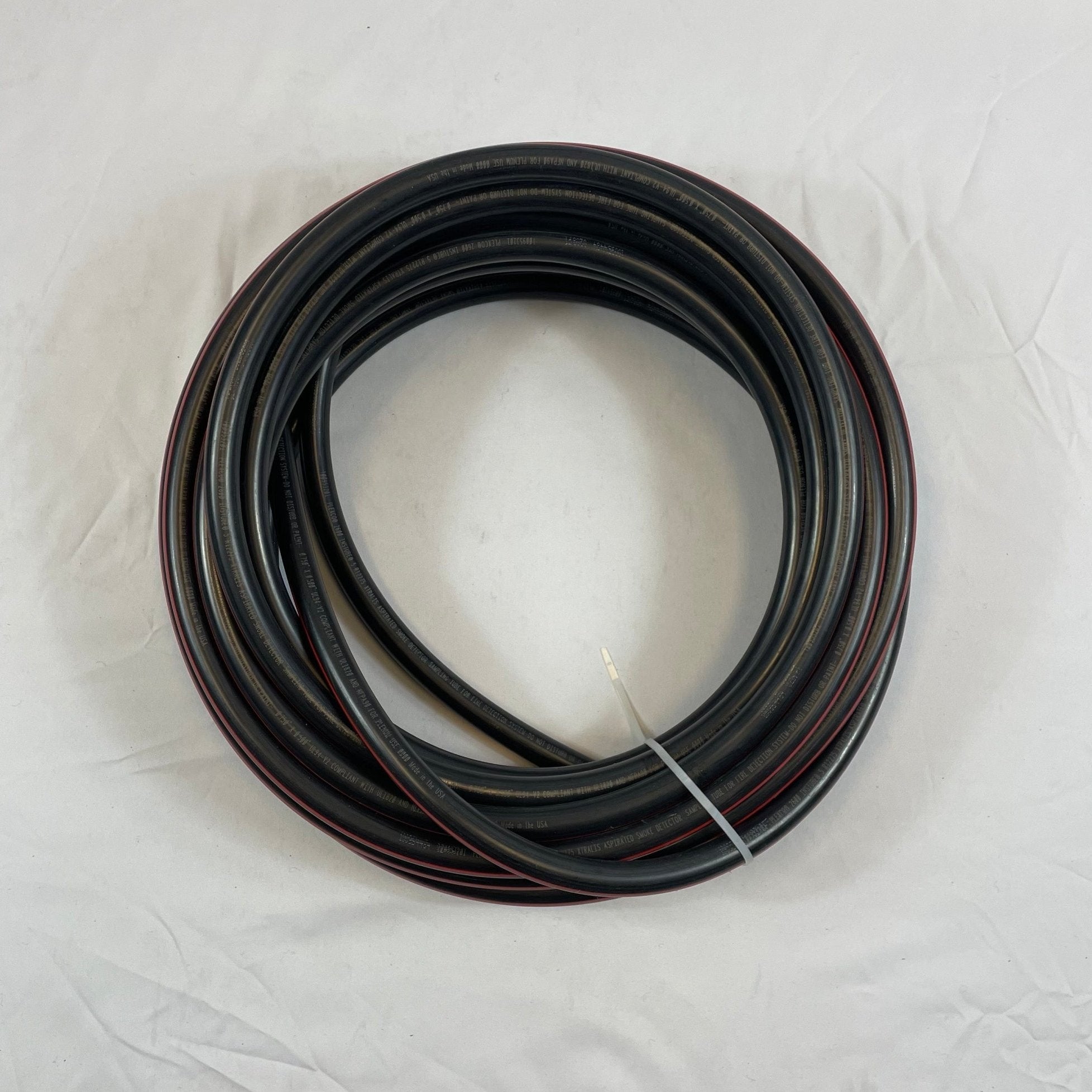 Siemens LF42249 50 ft flexible single-core tubing for fire alarm wiring, shown coiled and ready for installation.
