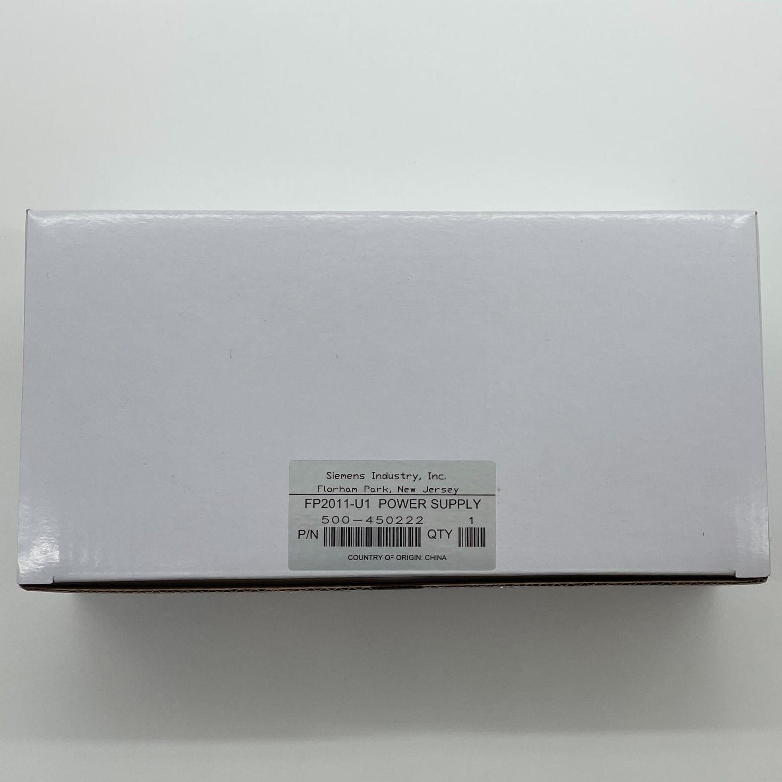 Siemens FP2011-U1 power supply unit with compact design, electronic components, and connectors for industrial automation systems.