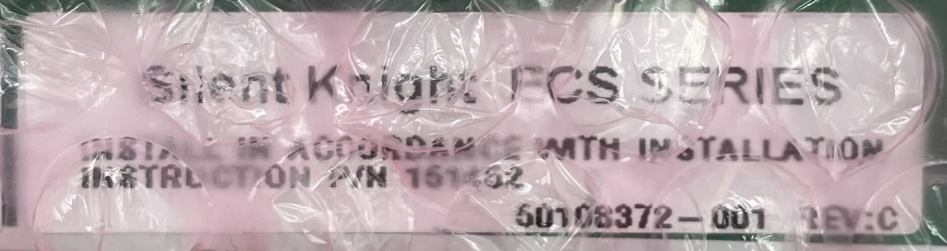 Silent Knight ECS-SW24 24-switch expander for fire alarm systems, black plastic device with multiple toggle switches.