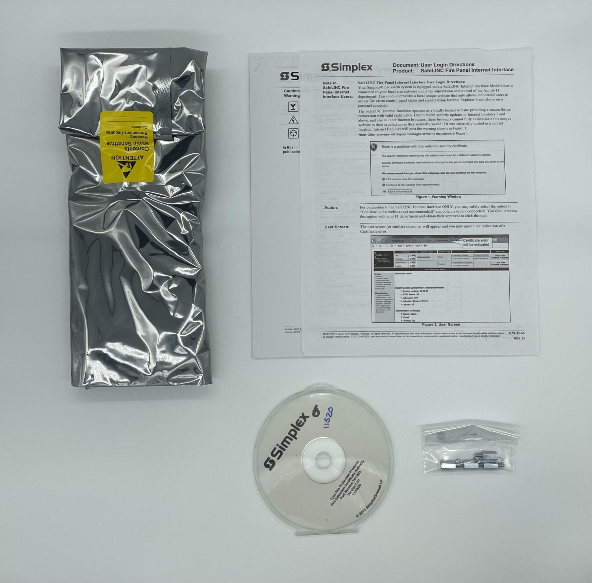 Simplex 4100-6079 fire alarm with white casing and test button, mounted on wall for fire safety detection.