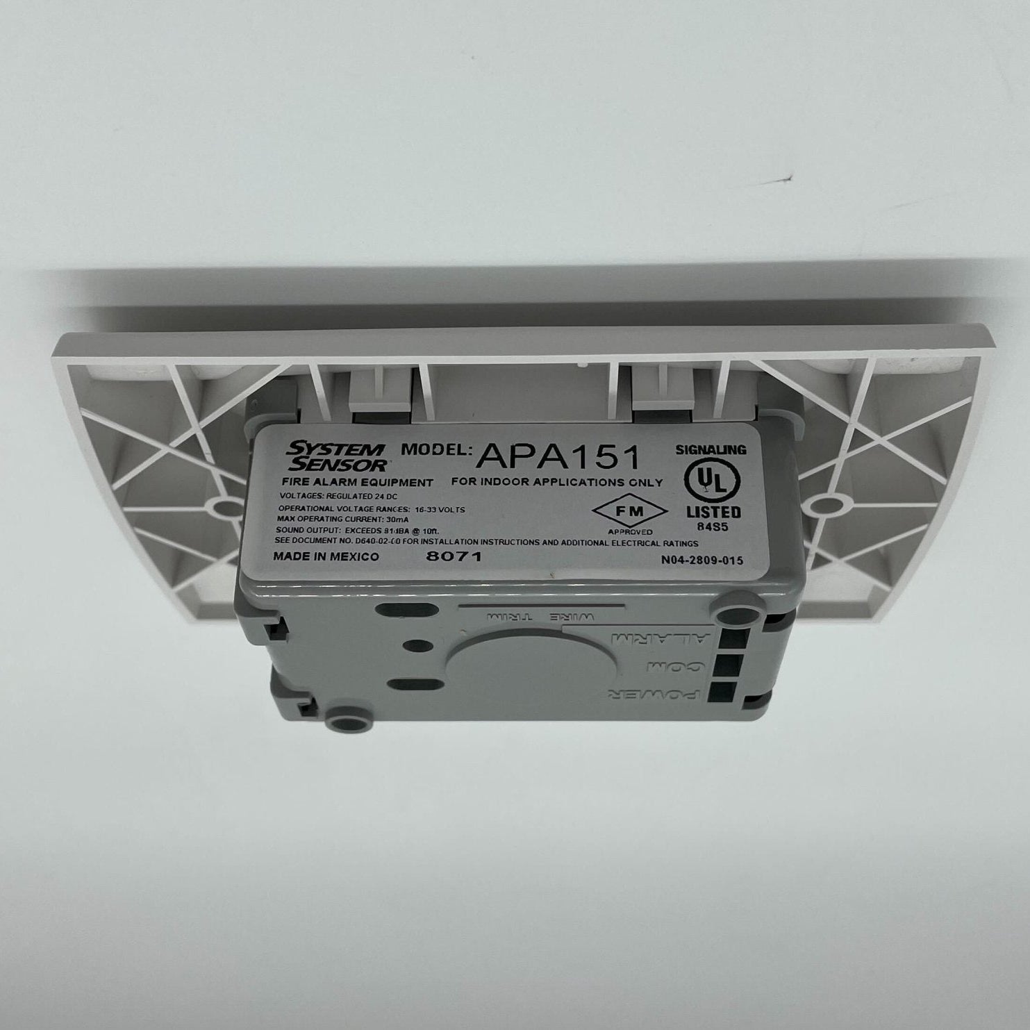 System Sensor APA151 annunciator panel with multiple indicator lights and control buttons for fire alarm systems.