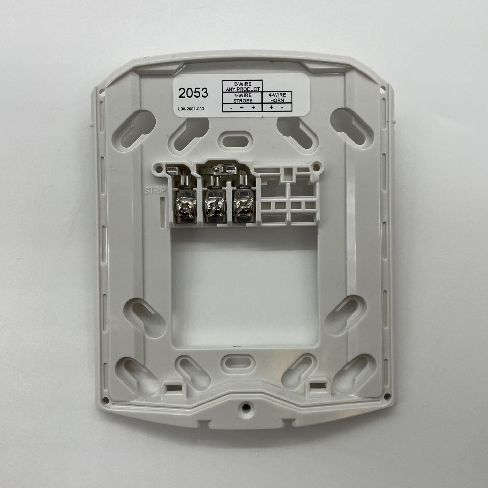 System Sensor PC2RHK outdoor horn strobe with selectable output, mounted on building exterior for emergency alert signaling.