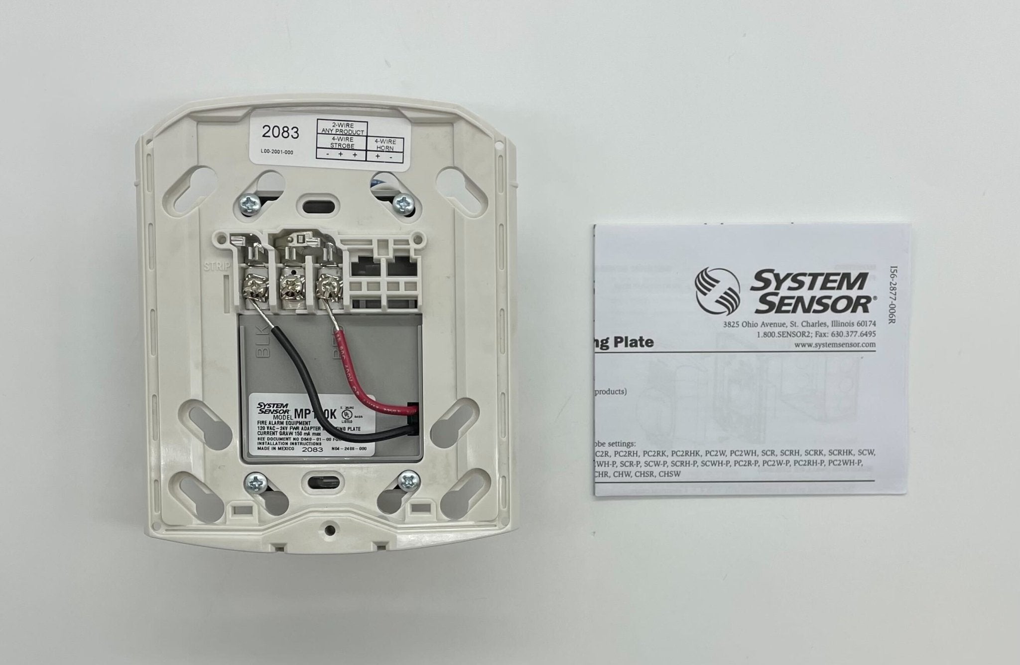 System Sensor MP120K 120 VAC adapter mounting plate for secure installation of sensor devices on walls or panels.