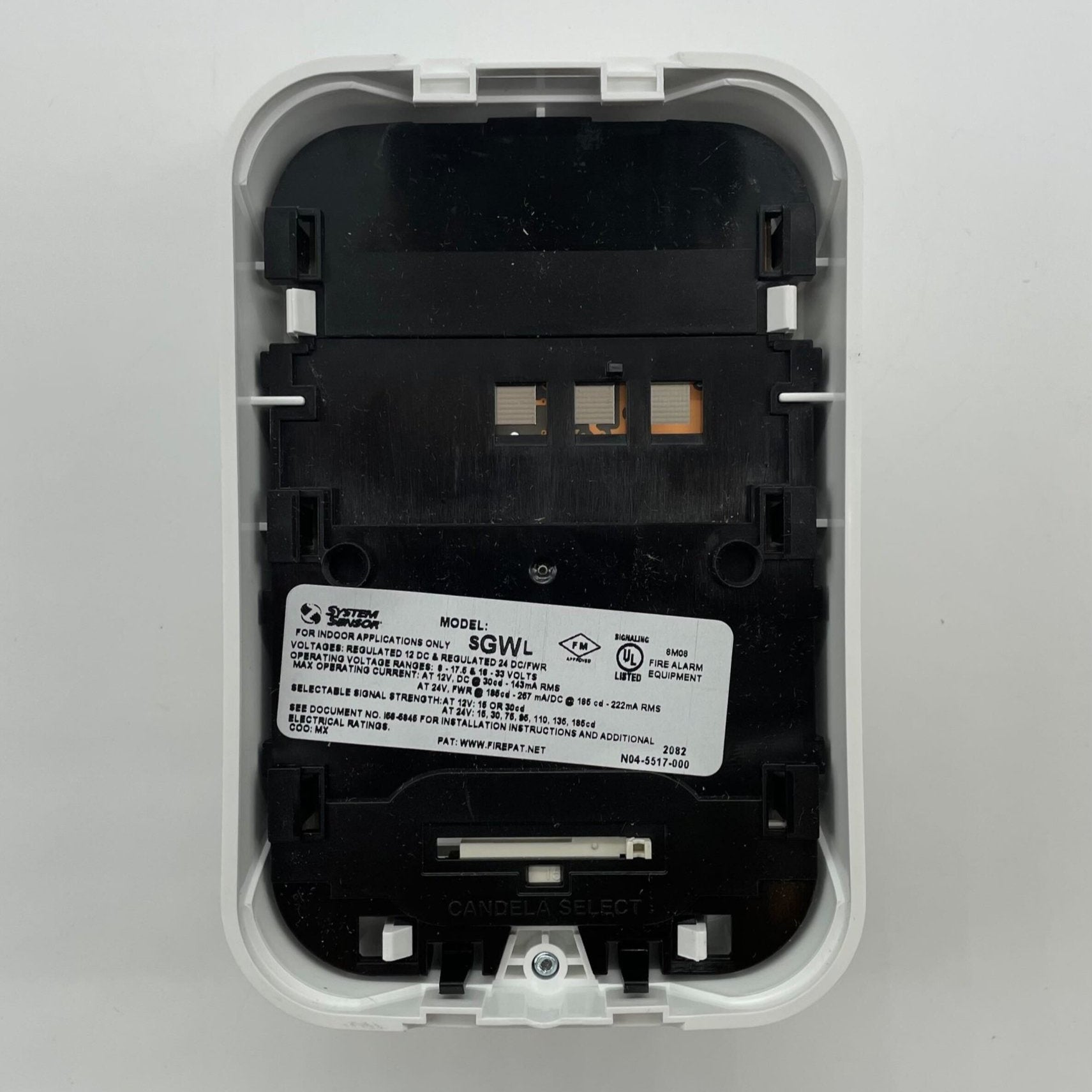 White wall-mounted System Sensor SGWL strobe light, industrial safety warning device with bright flashing alert